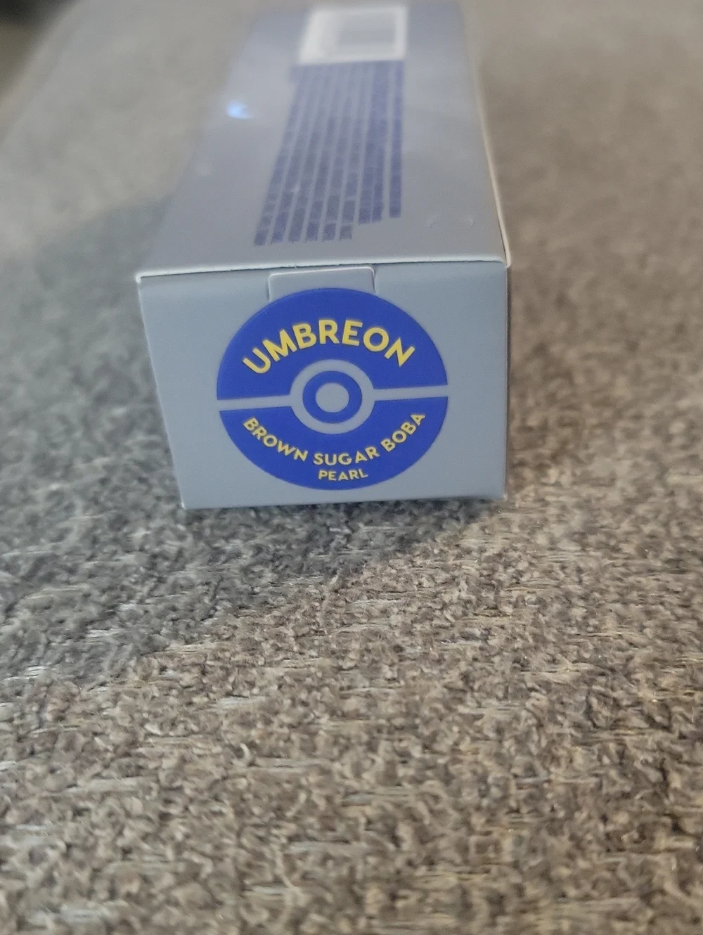 ColourPop Pokémon Umbreon Glossy Lip Balm — Brown Sugar Boba